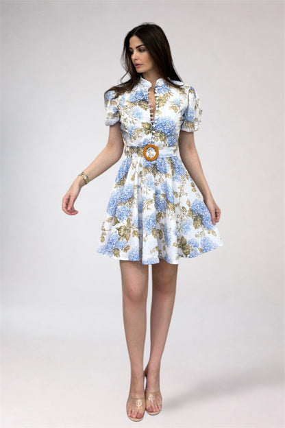 Woman wearing a floral dress with a white background