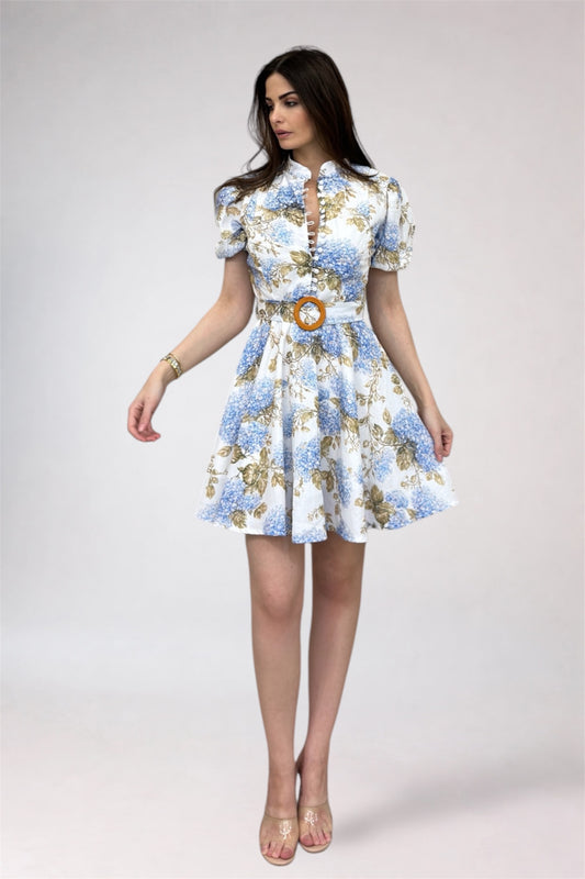 Woman wearing a floral dress with a white background