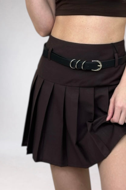 Brown pleated skirt with a black belt on a white background