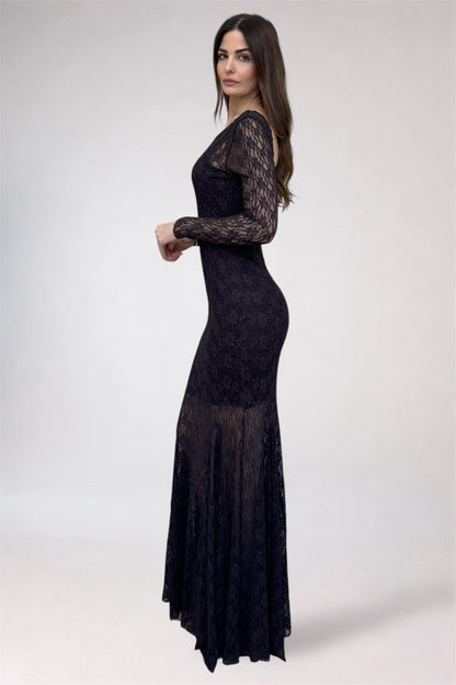 Woman wearing a black lace dress on a white background