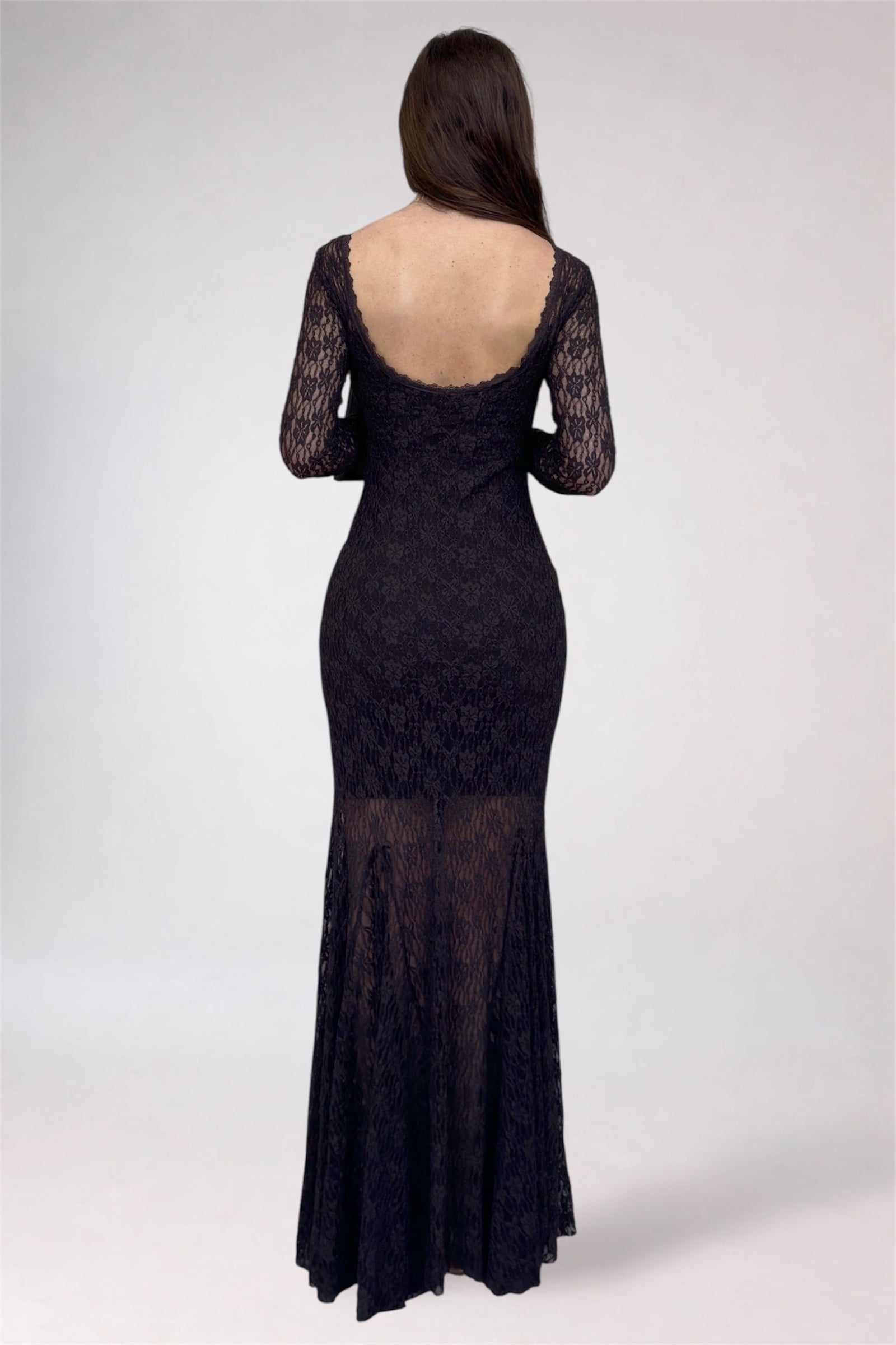 Black lace evening gown on a white background