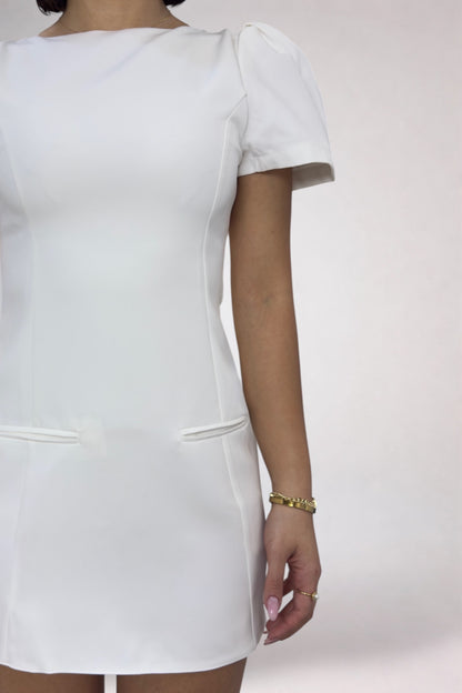 White dress with short sleeves on a white background