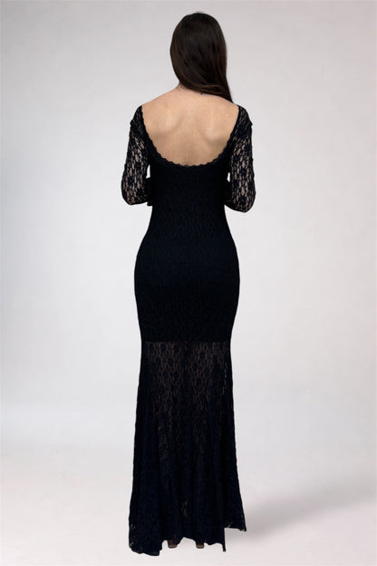 Black lace evening gown on a white background