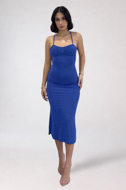 Woman wearing a blue dress on a white background