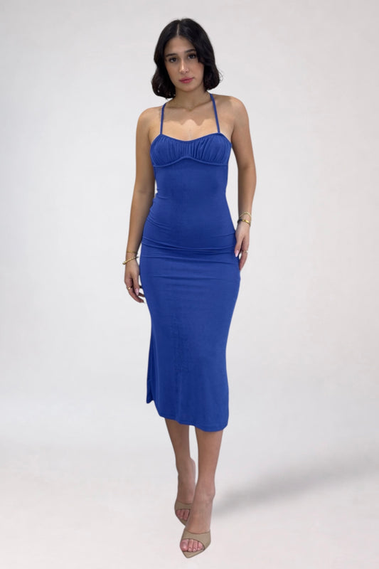 Woman wearing a blue dress on a white background