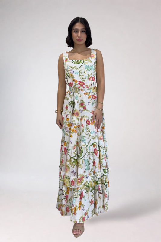 Woman wearing a floral dress on a white background