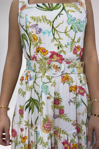 Floral dress with colorful patterns on a plain background