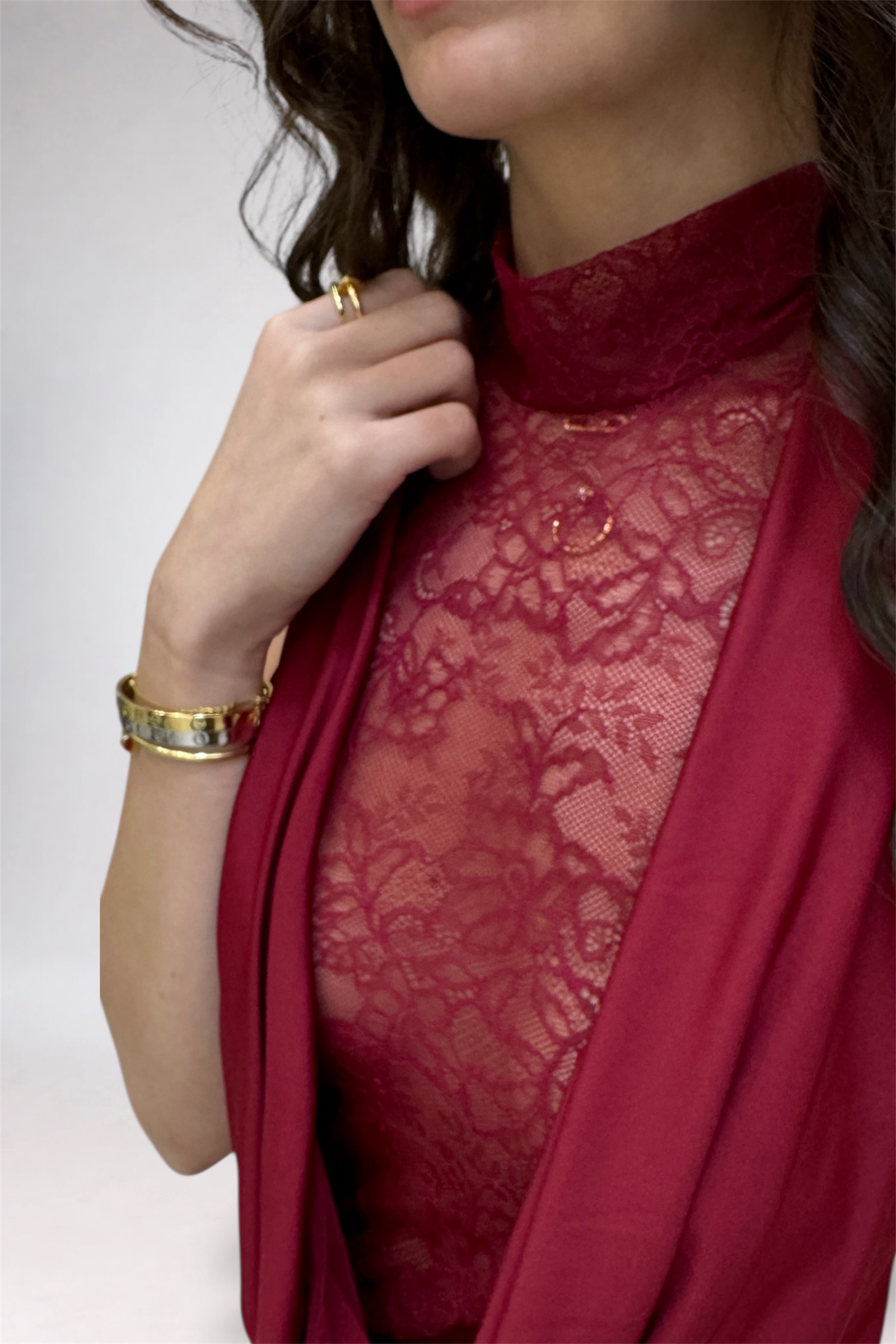 Red lace garment with a plain background