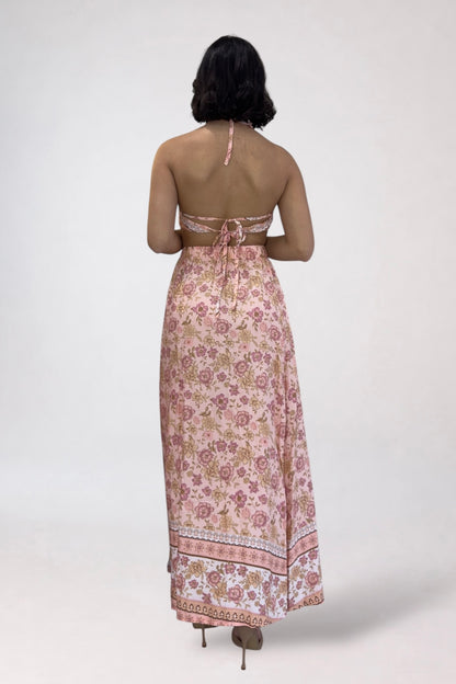Woman wearing a floral dress with a white background