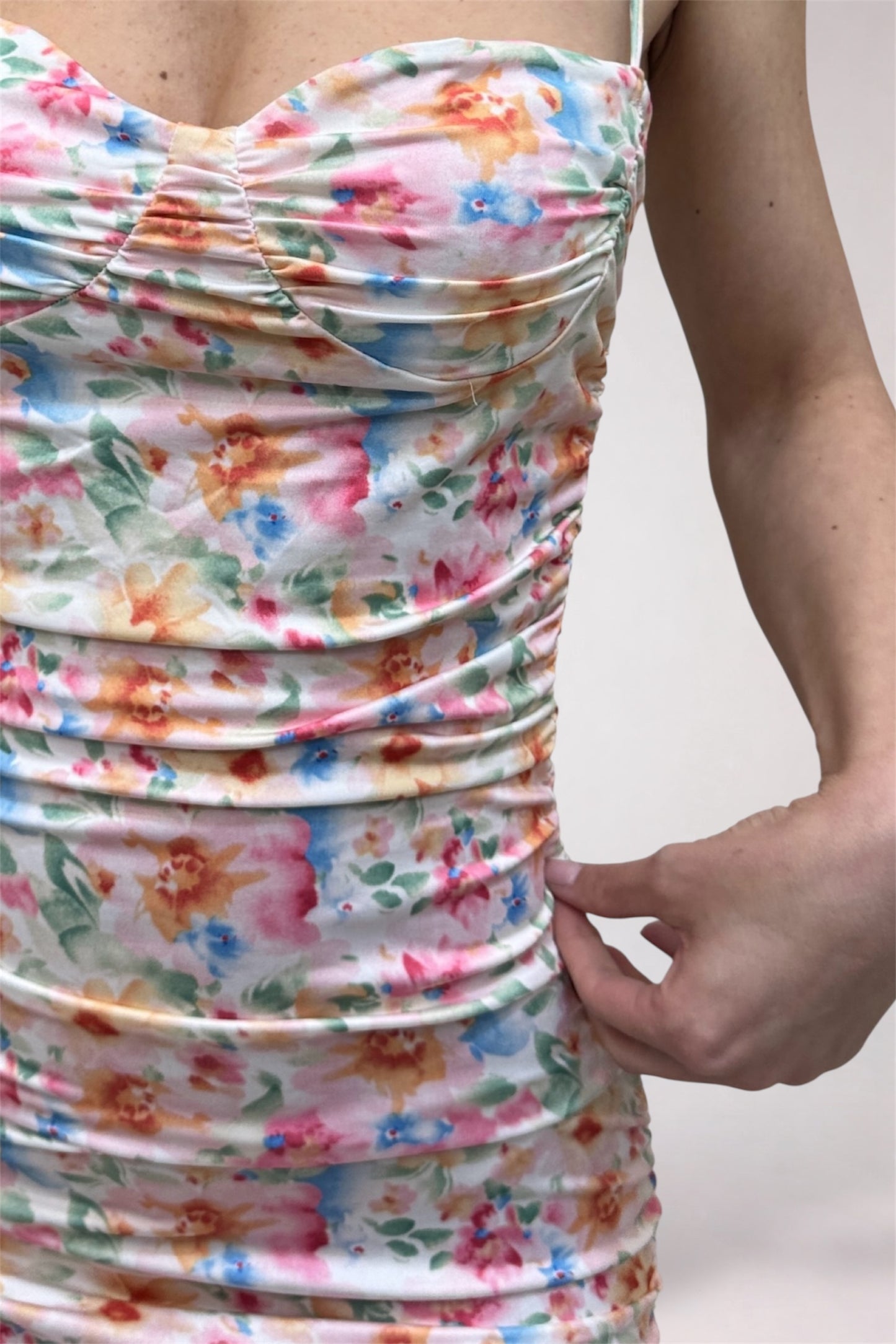 Close-up of a floral dress with a white background