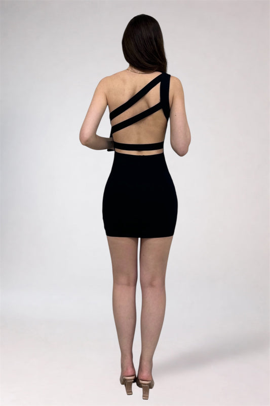 Black dress with cut-out back design on a white background