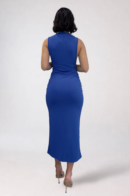 Woman wearing a blue dress on a white background