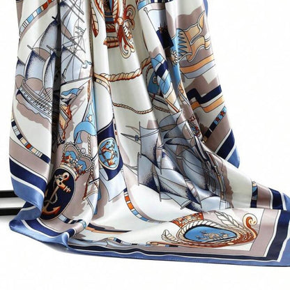 Decorative scarf with ship and anchor pattern on a white background